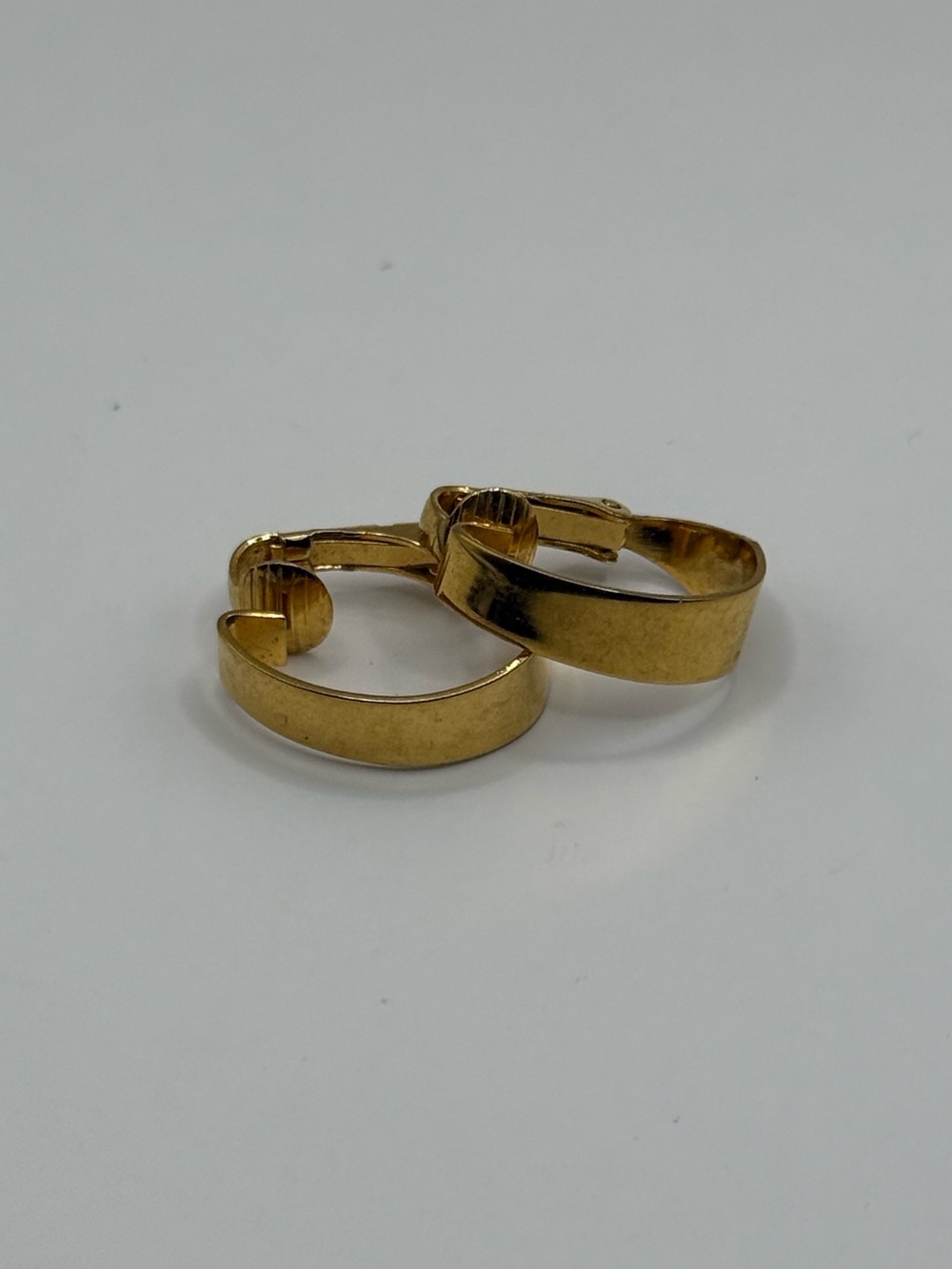 Vintage crown Trifari gold tone clip-on hoop earrings